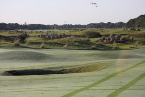 Pot bunkers, mounds and gorse on the 4th hole