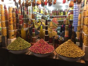 Shopping for fresh olives in Djemaa-El-Fnaa (The Central Square) in Marrakesh